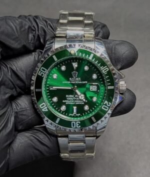 Rolex Submariner with green dial and date just