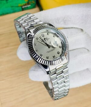 Rolex silver chain with silver dial and date just