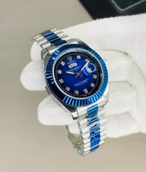 Rolex fluted bazel blue silver chain with blue dial and date day function