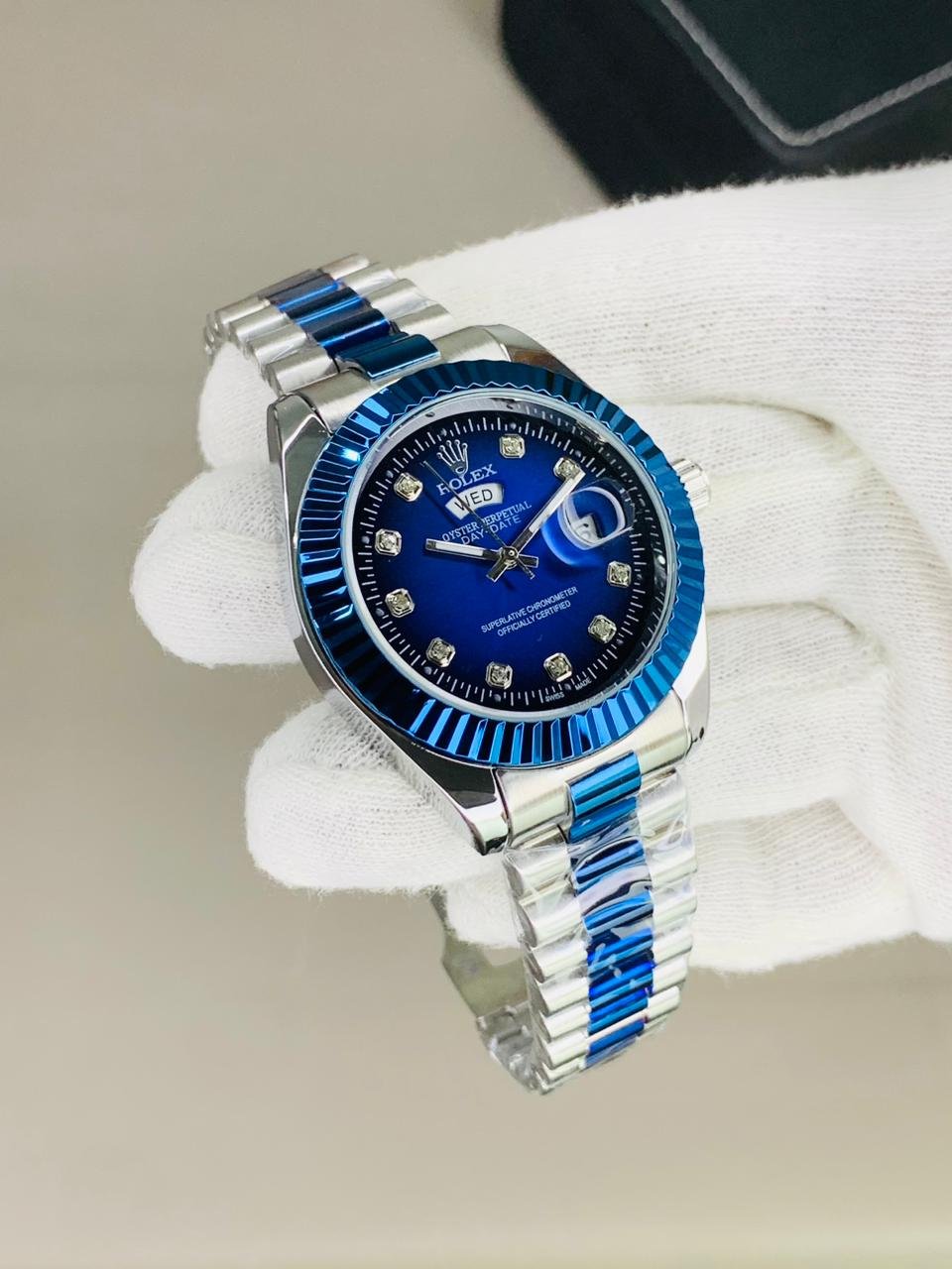 Rolex fluted bazel blue silver chain with blue dial and date day function